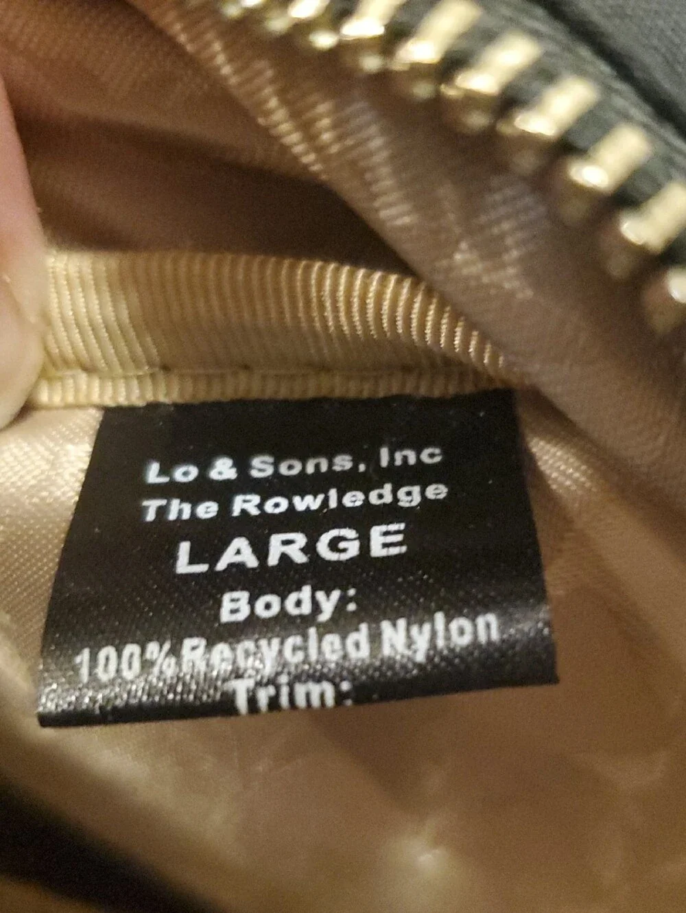 Lo & Sons Black Backpack with Gold Zipper Accents